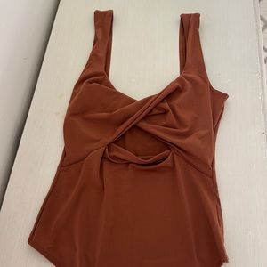 Women’s Abercrombie tan brownish color fitted bodysuit with cutout